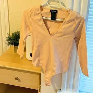 Bebe pale women’s bodysuit size small no flaws